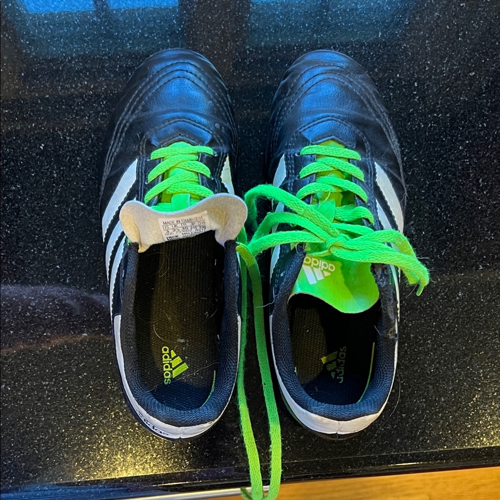 Adidas Black Cleats with Green Laces